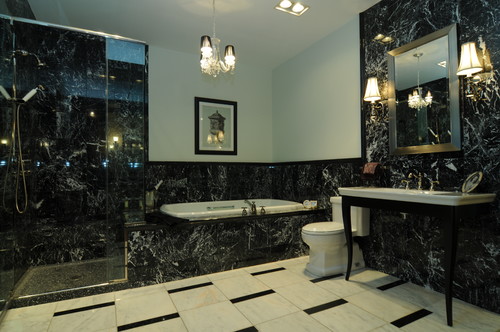 full black slab marble bathroom