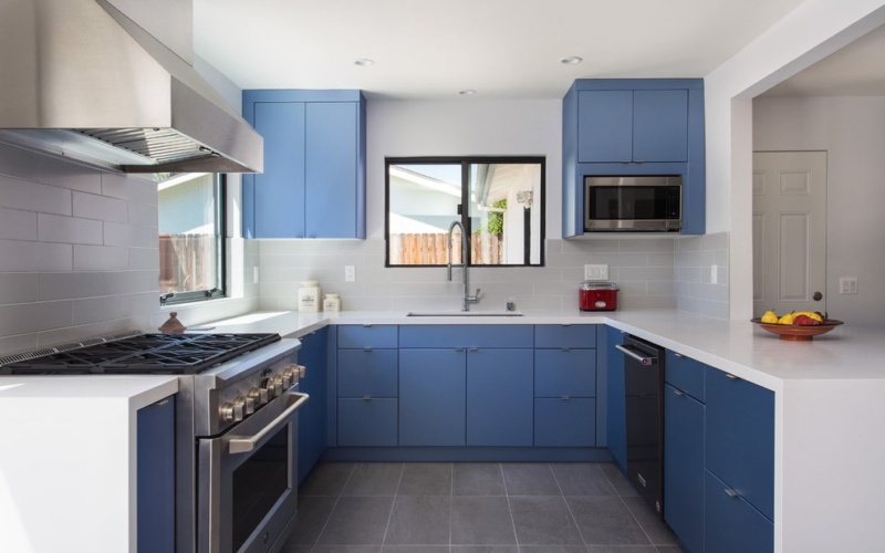 white kitchen-countertops with blue cabinets